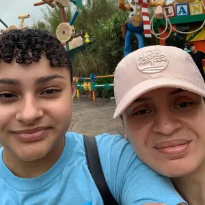 two women smiling at camera